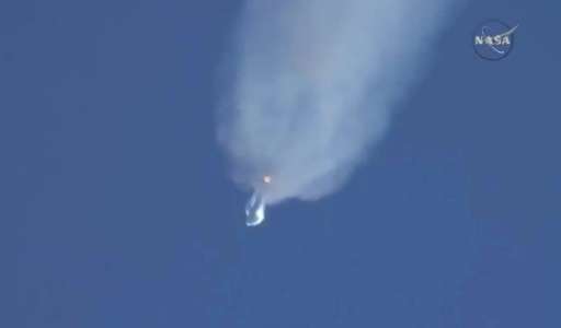 This June 28, 2015 grab from NASA TV shows the SpaceX Falcon 9 rocket with the unmanned Dragon cargo capsule on board exploding 