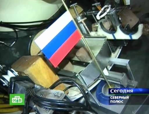 This Russian NTV channel image grab taken on November 7, 2014 shows the Russian flag fixed on board the Mir-1mini-submarine as i