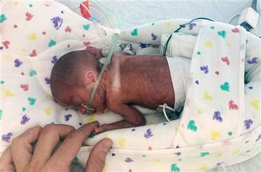 Tiny, premature baby survives birth on a cruise ship