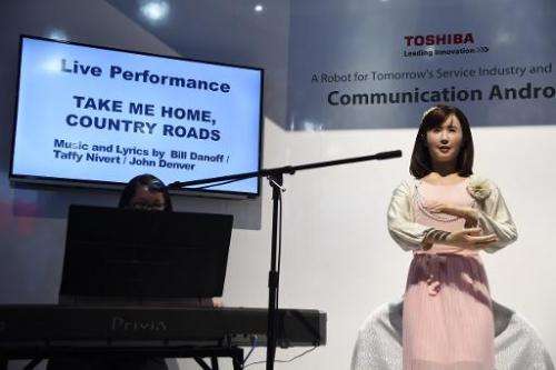 Toshiba's &quot;Communication Android&quot; robot named Chihira Aico sings John Denver's classic song &quot;Take Me Home Country