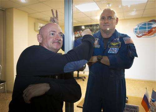 Twin fools NASA at brother's launch on 1-year flight