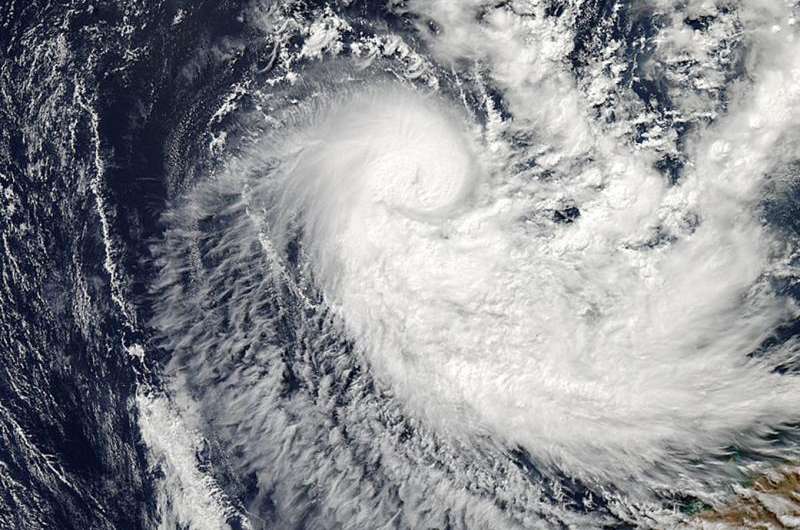 Two NASA views of newborn Tropical Cyclone Quang