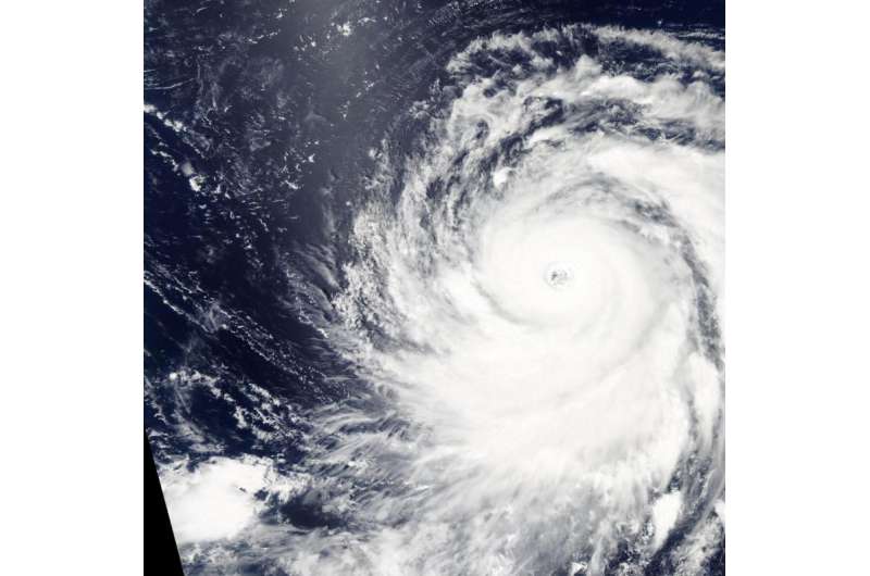 Two views of Super Typhoon Atsani from NASA's Aqua Satellite
