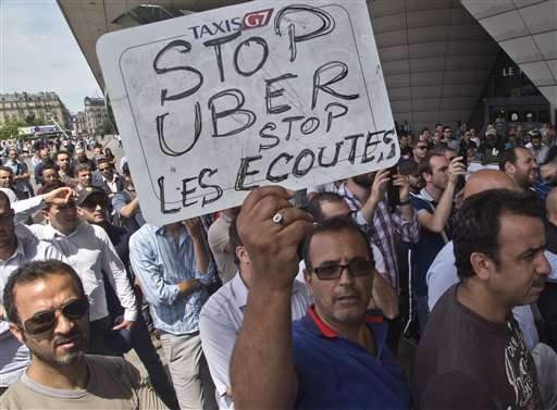 Uber suspends low-cost service in France amid legal pressure