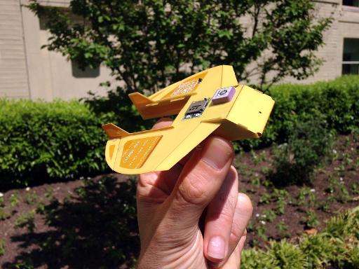 US military scientists have invented a miniature drone that fits in the palm of a hand, ready to be dropped from the sky like a 