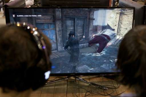 Videogamers play on an alpha version of French video game developer Ubisoft's last installment of &quot;Assassin's Creed&quot;, 