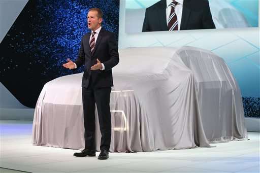 Volkswagen apologizes for emissions scandal at auto show