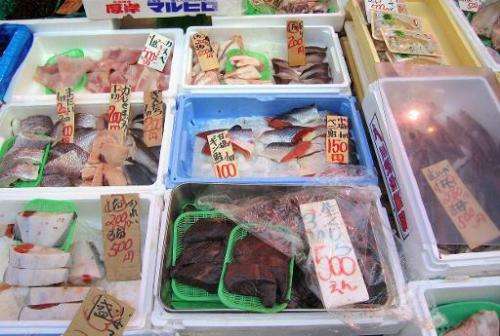 Whale meat (centre-bottom) is sold at a streetside seafood shop in Tokyo