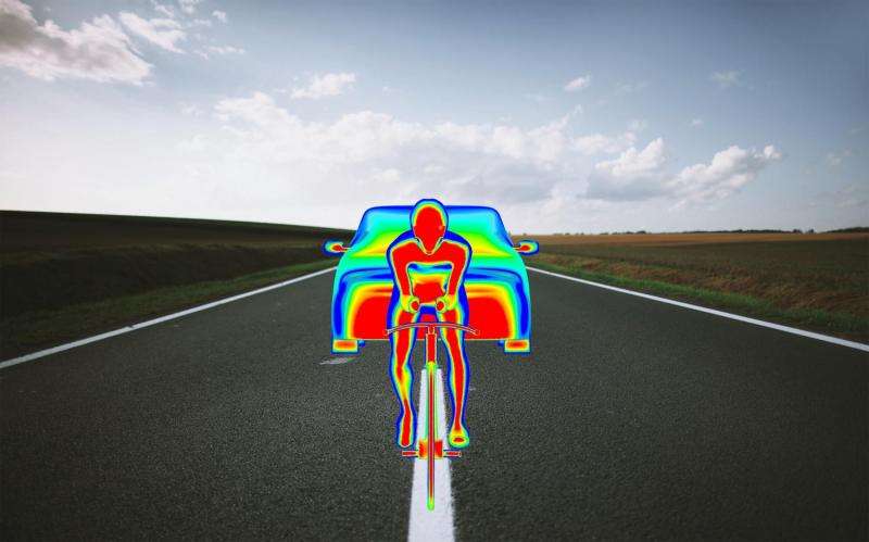 Wind effect following team car can help time trial rider win Tour prologue