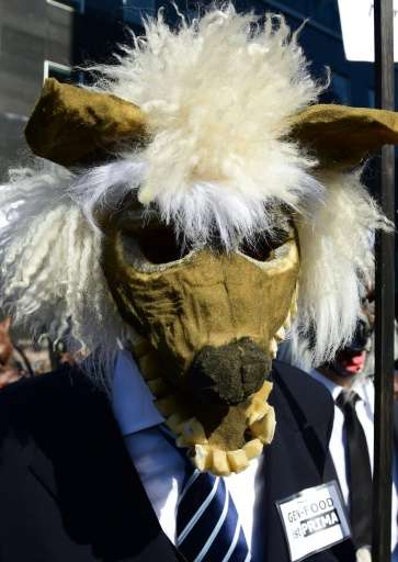 A demonstrator dressed as a genetically modified monster takes part in an anti-GM rally in Berlin