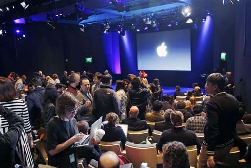 Apple starts a busy week with new iPhone launch