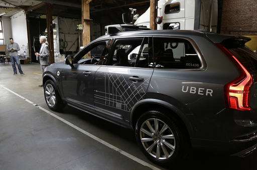 Arizona governor welcomes Uber fleet of self-driving cars (Update)