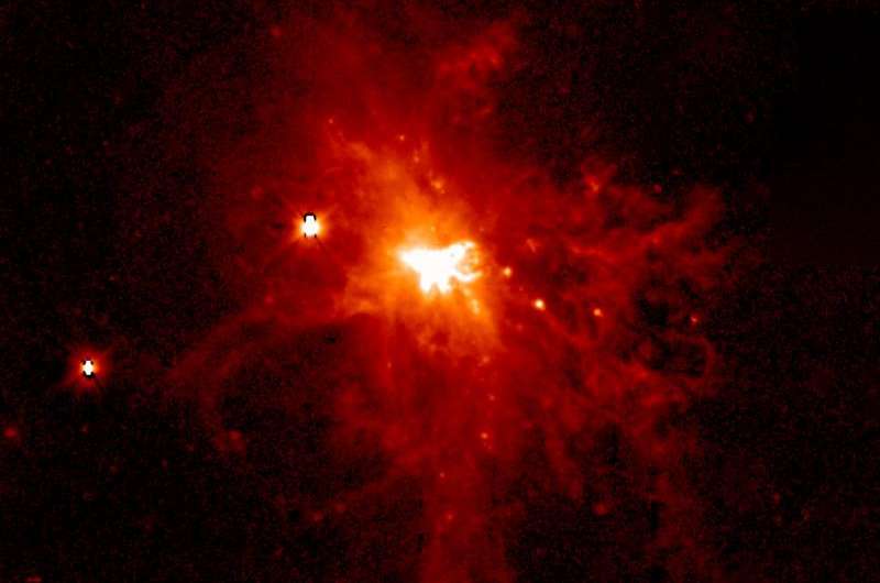 A violent wind blown from the heart of a galaxy tells the tale of a merger