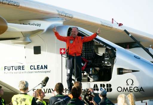 Bertrand Piccard celebrates at Sevilla airport on June 23, 2016, after the 70-hour sun-powered journey from New York