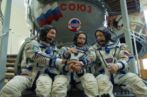 From L: US astronaut Shane Kimbrough and Russian cosmonauts Sergey Ryzhikov and Andrey Borisenko, pictured during preflight trai