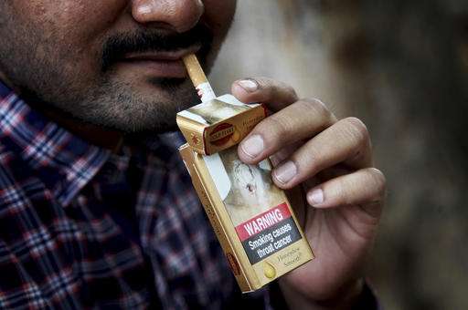 Global gov'ts: Make tobacco firms liable for smoking harm