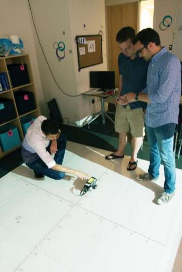 Grade-school students teach a robot to help themselves learn geometry