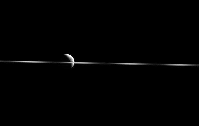 Image: Saturn's rings dividing Dione