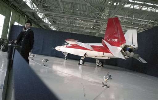 Japan unveils stealth plane, may combine with next-gen jet