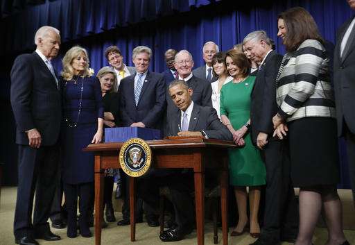 Obama signs bill boosting spending on cancer research