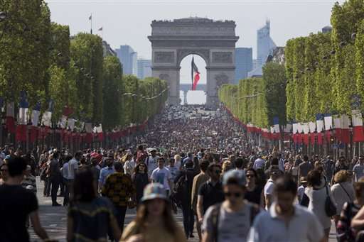 Pedestrians take over Champs-Elysees as Paris goes green