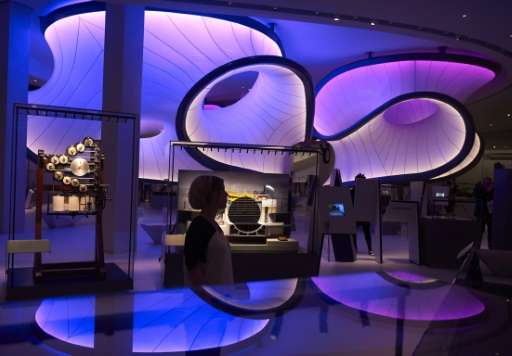 People walk through a new gallery, Mathematics: The Winton Gallery, inside the Science Museum during a press view in London on D