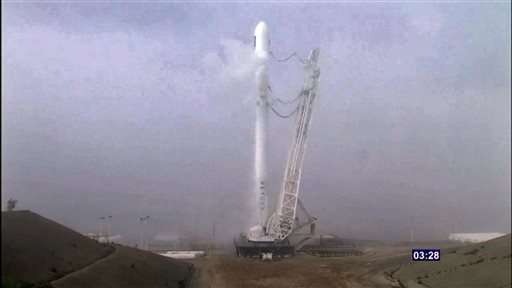 Support leg breaks as SpaceX rocket lands on ocean barge (Update)