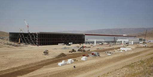 Tesla opens Gigafactory to expand battery production, sales