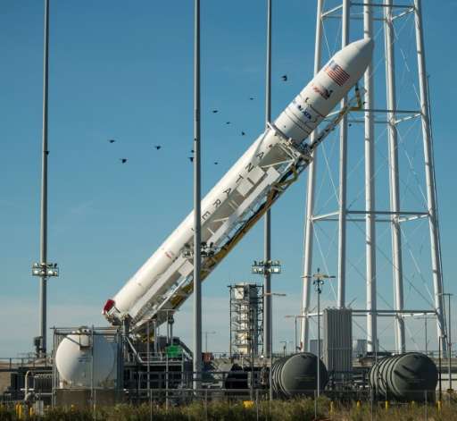 The Antares rocket is raised into the vertical position on the launch pad at NASA's Wallops Flight Facility in Virginia