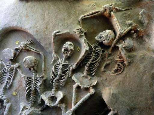 The remains of men buried in a mass grave found in an area of the Falirikon Delta in South Athens