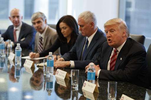 Trump tells anxious tech leaders: 'We're here to help'