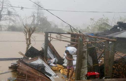 Typhoon Haima churns toward China after lashing Philippines