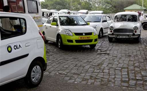 Uber, Ola face off in battle for India's booming taxi market