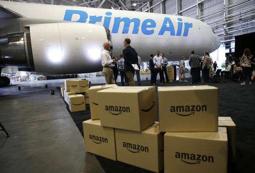 Amazon unveils cargo plane as it expands delivery network