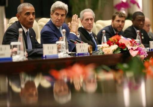 US President Barack Obama and US Secretary of State John Kerry attend a meeting ahead of the G20 summit in Hangzhou, China