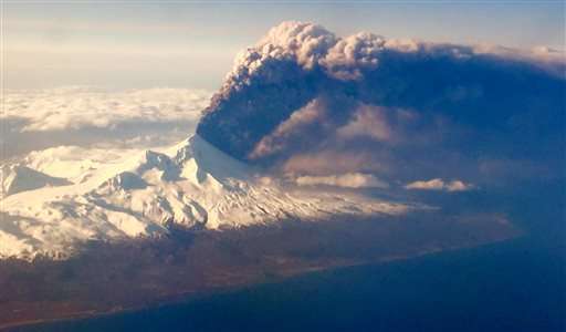 Ash coats village areas near erupting Alaska volcano