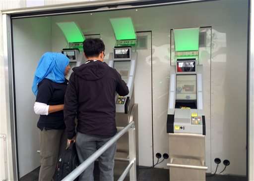 Border checkpoint scans eyes, faces of departing foreigners
