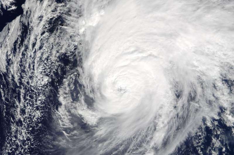NASA sees large Hurricane Nicole moving past Bermuda
