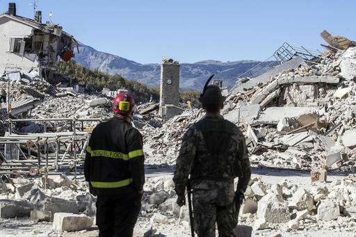Powerful Italy quake spares lives, but strikes at identity (Update)
