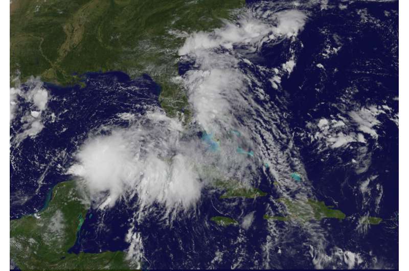 Satellite sees large Tropical Depression 9 in the Gulf of Mexico