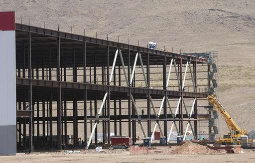 Tesla opens Gigafactory to expand battery production, sales