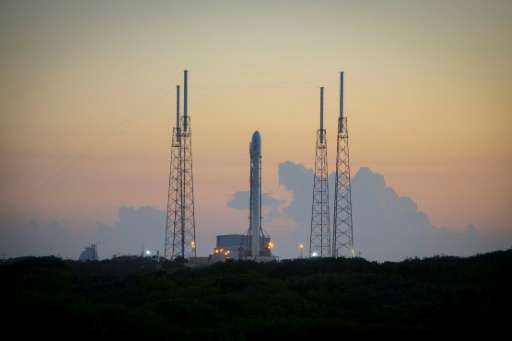 The SpaceX Falcon 9 rocket sits on the launch pad at Cape Canaveral, Florida