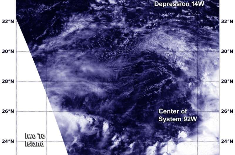 Tropical Depression 14W gets absorbed by system 92W