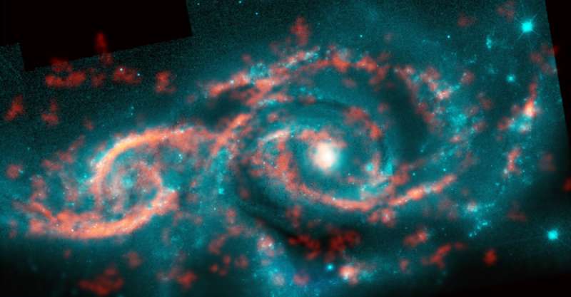 Tsunami of stars and gas produces dazzling eye-shaped feature in galaxy