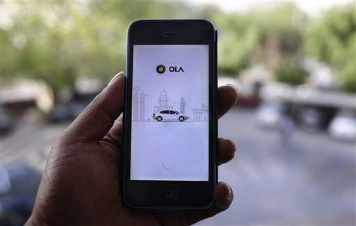 Uber, Ola face off in battle for India's booming taxi market