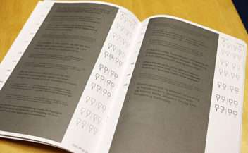 What makes print more readable for the visually impaired?