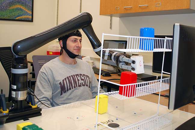 University of Minnesota research shows people can control a robotic arm with only their minds