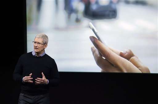 Apple's new iDevices say: Small is beautiful, too