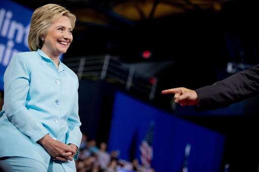 FBI investigates DNC hacking; Clinton campaign blames Russia