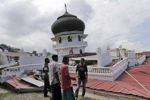Frantic rescue after quake kills dozens in Indonesia's Aceh